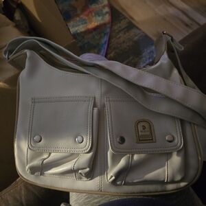 Phoenix collection, purse, very beautiful. It's brand new cream Colored